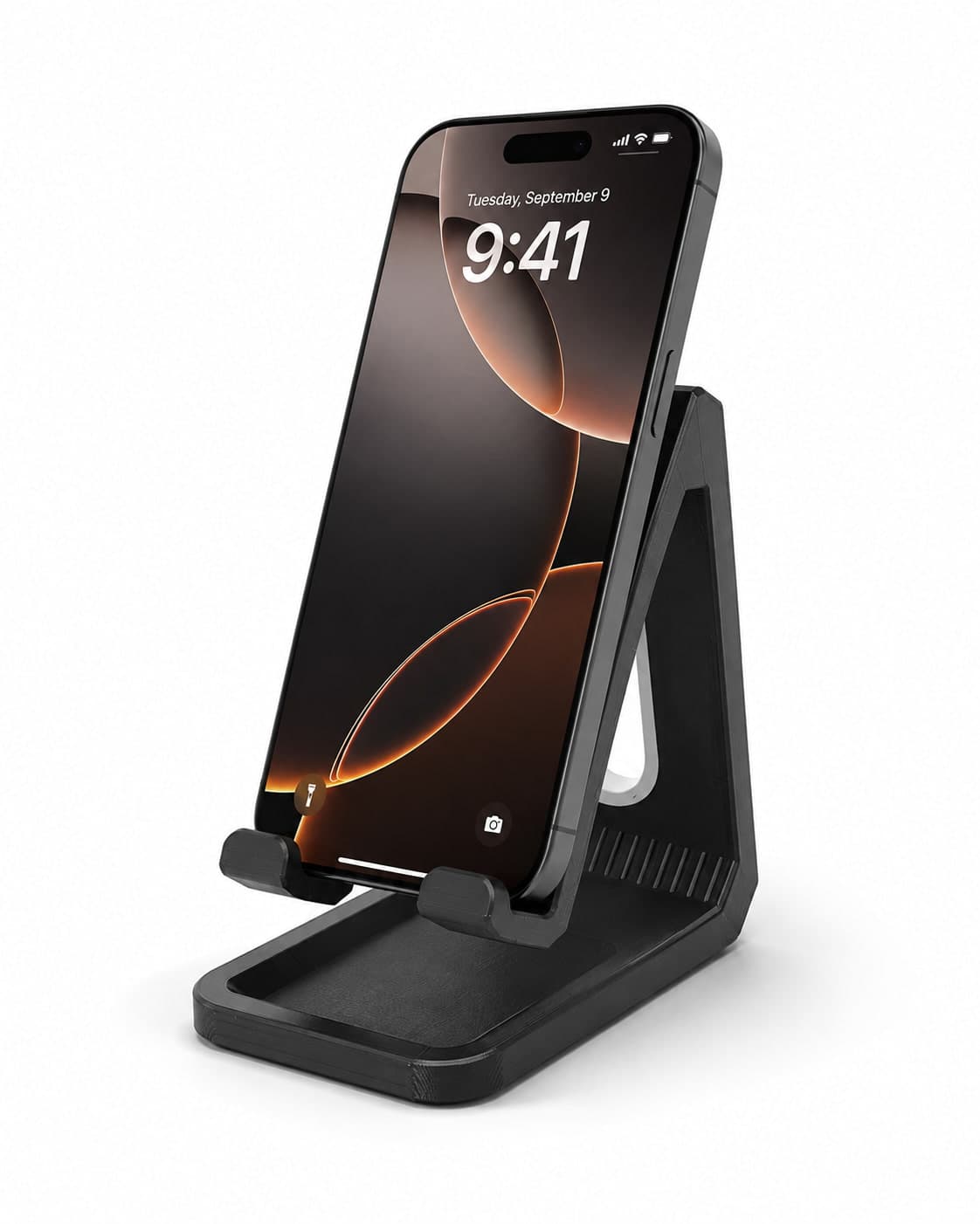 Black 3D-printed phone stand holding a phone upright with its lock screen showing